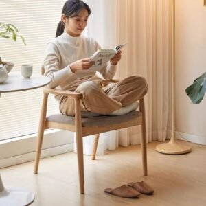 Solid ash wood chair with smooth edges and wood grain detail